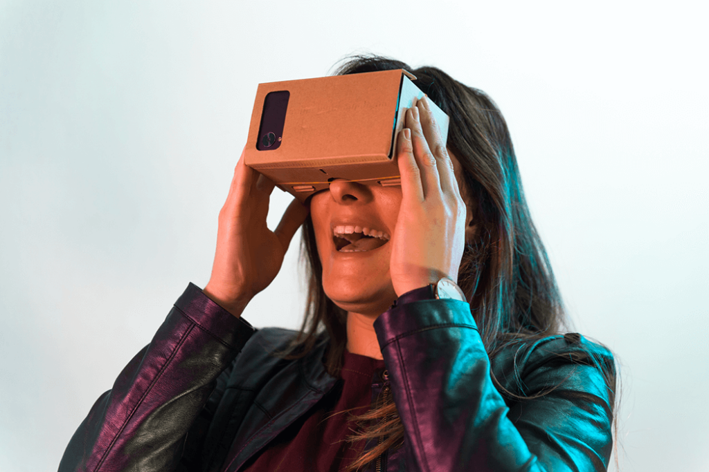 woman using a cardboard headset