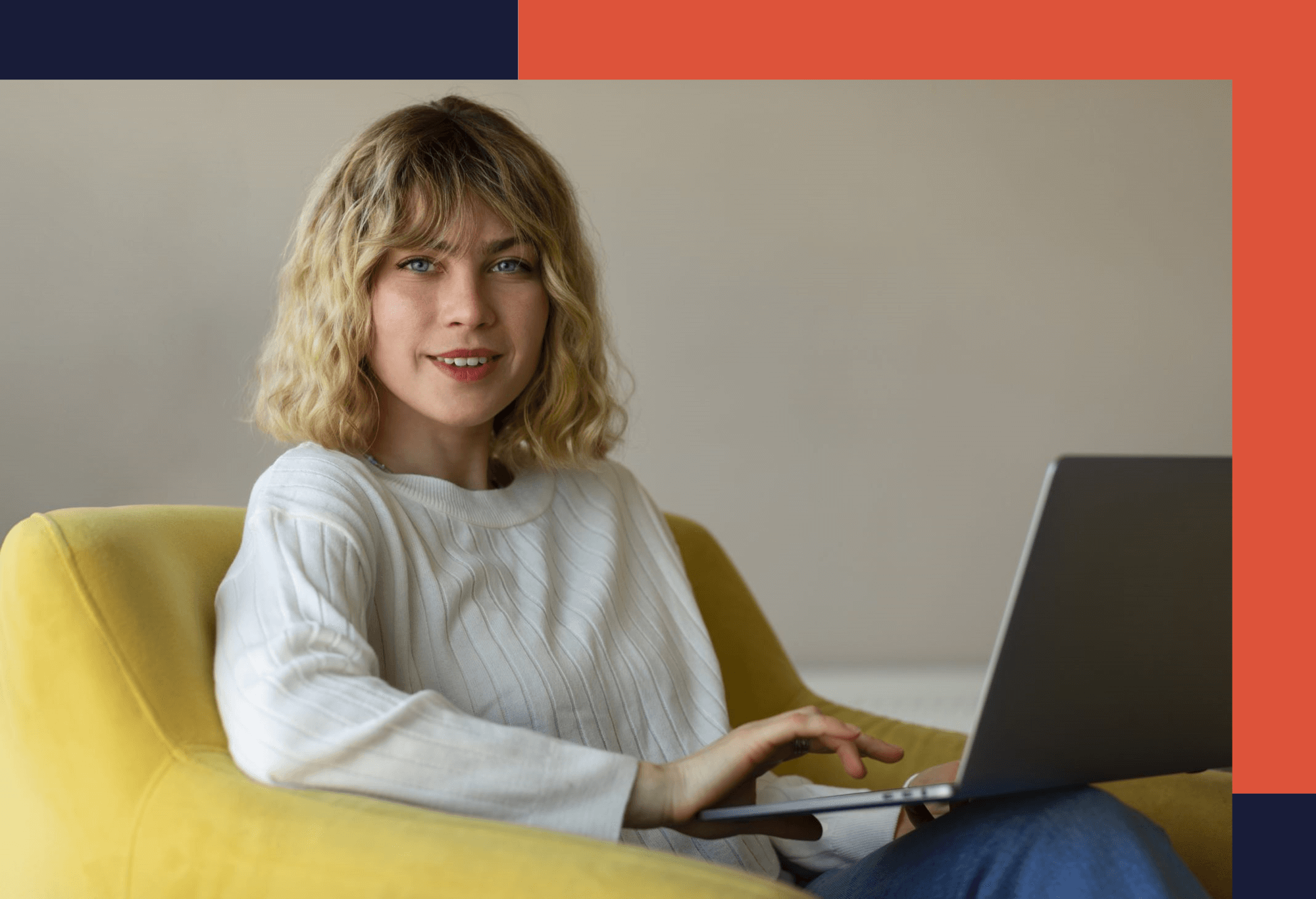 Side view of a woman working on a laptop