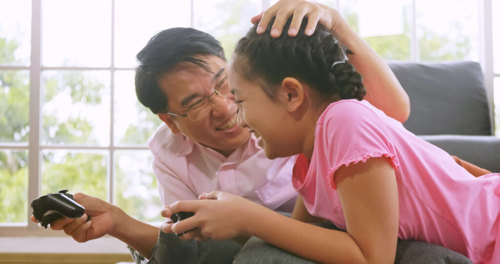 happy family wtih father and daugther spending time together